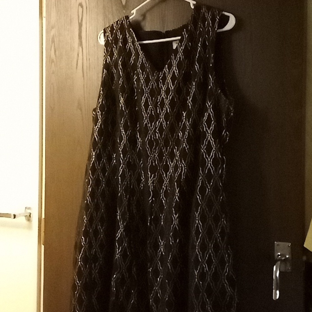 Black and Gold Party Dress by Monroe and Main. Looks stunning with a belt.